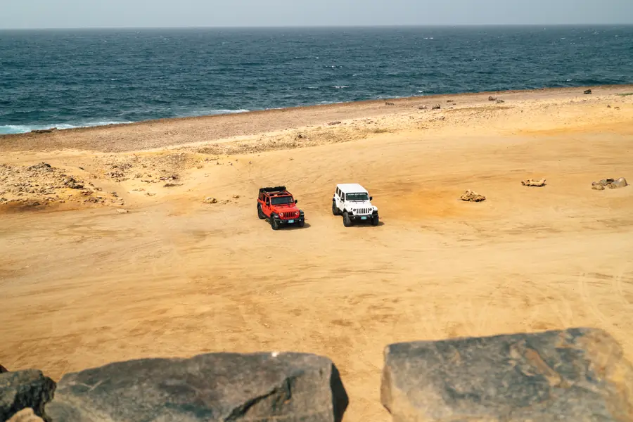 Two EFE Jeeps on the sand on the north coast
